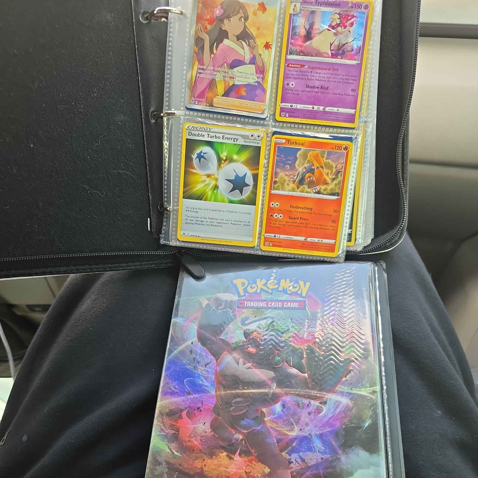 2 Pokémon binders with some cards 7x9 perfect for collection  fast shipping 