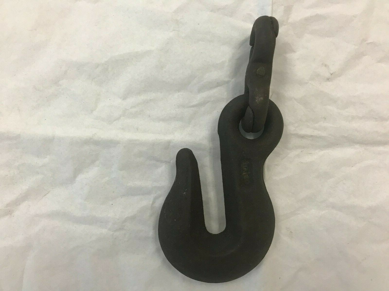Antique 3/8" Cast Iron Hook with "143" , "H" , and "3/8" identifying the Hook