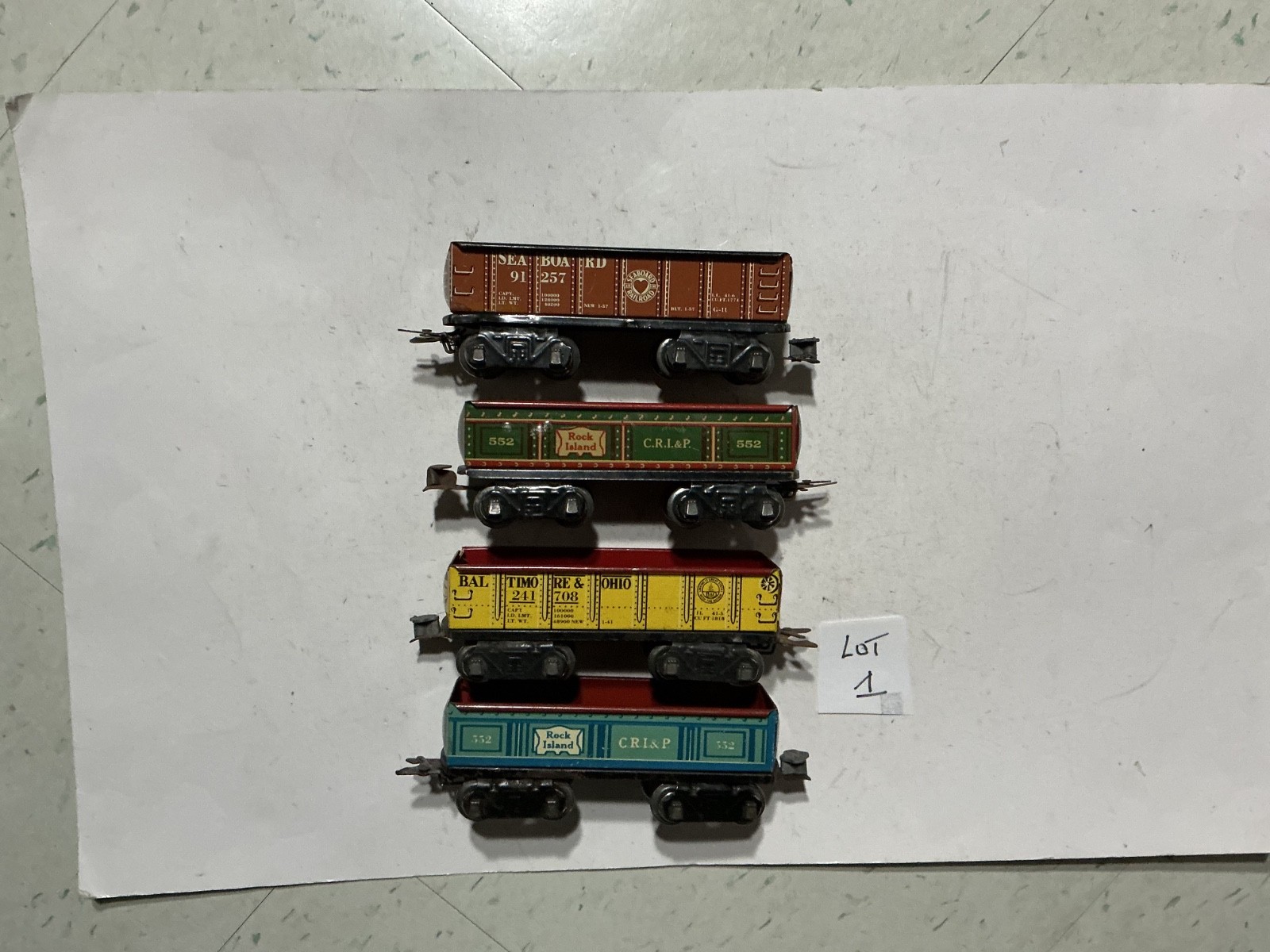 Marx 0 Gauge :  4 Gondola  cars:  with 1 way couplers.  Lot 1