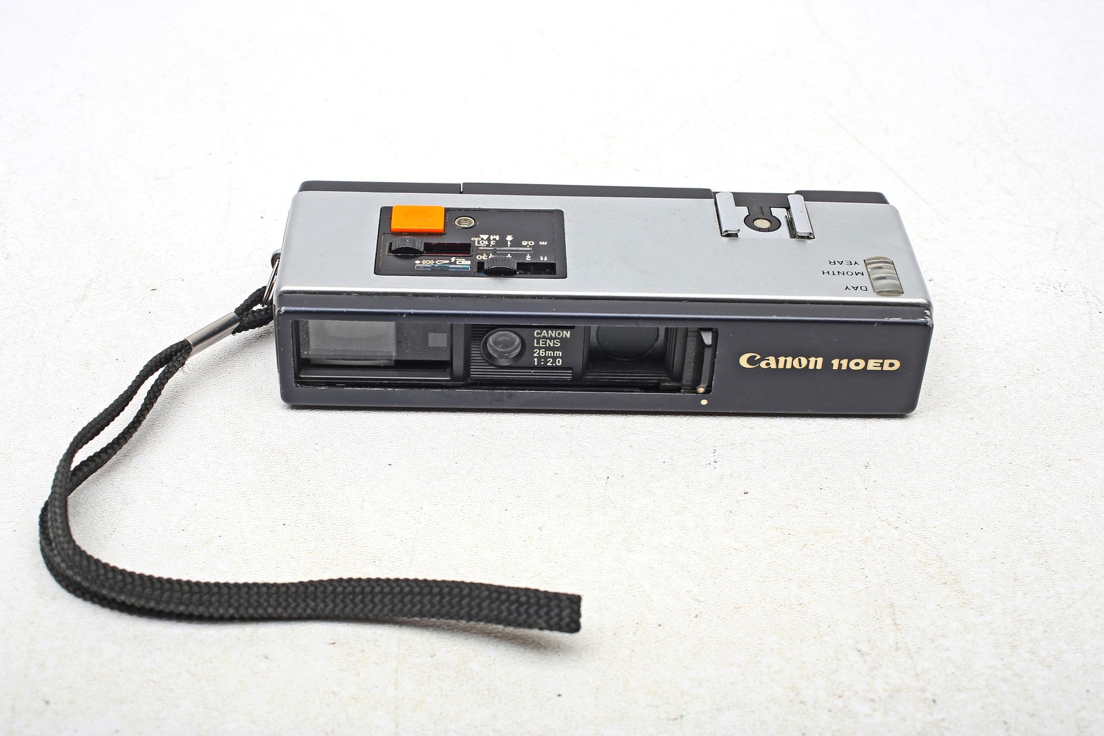 Canon 110ED/110-ED - 110 Film rangefinder camera+Wrist Strap+WORKS+NiCE