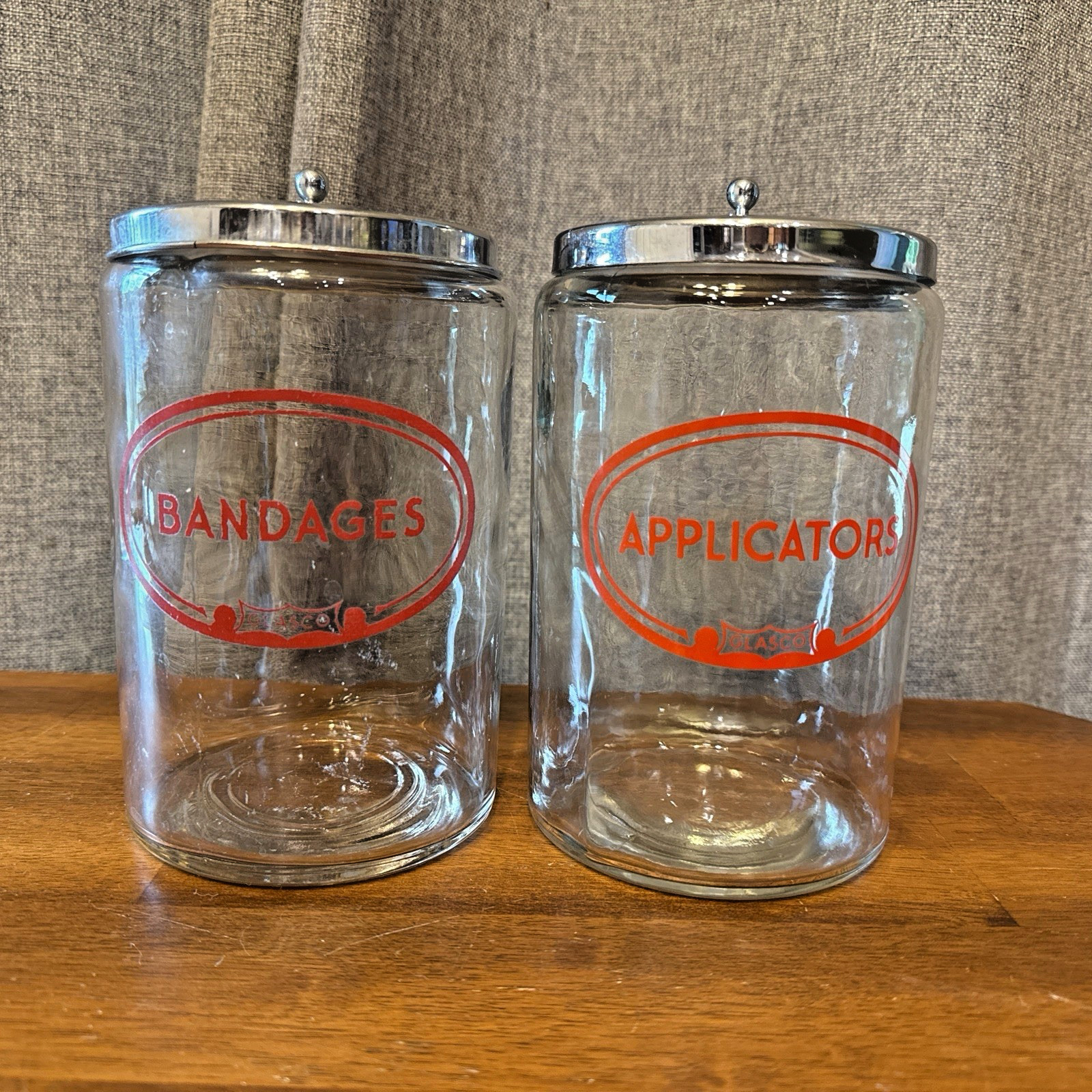 2 Glass “MERCO” Apothecary Jars VINTAGE containers Doctor Medical Office SS tops