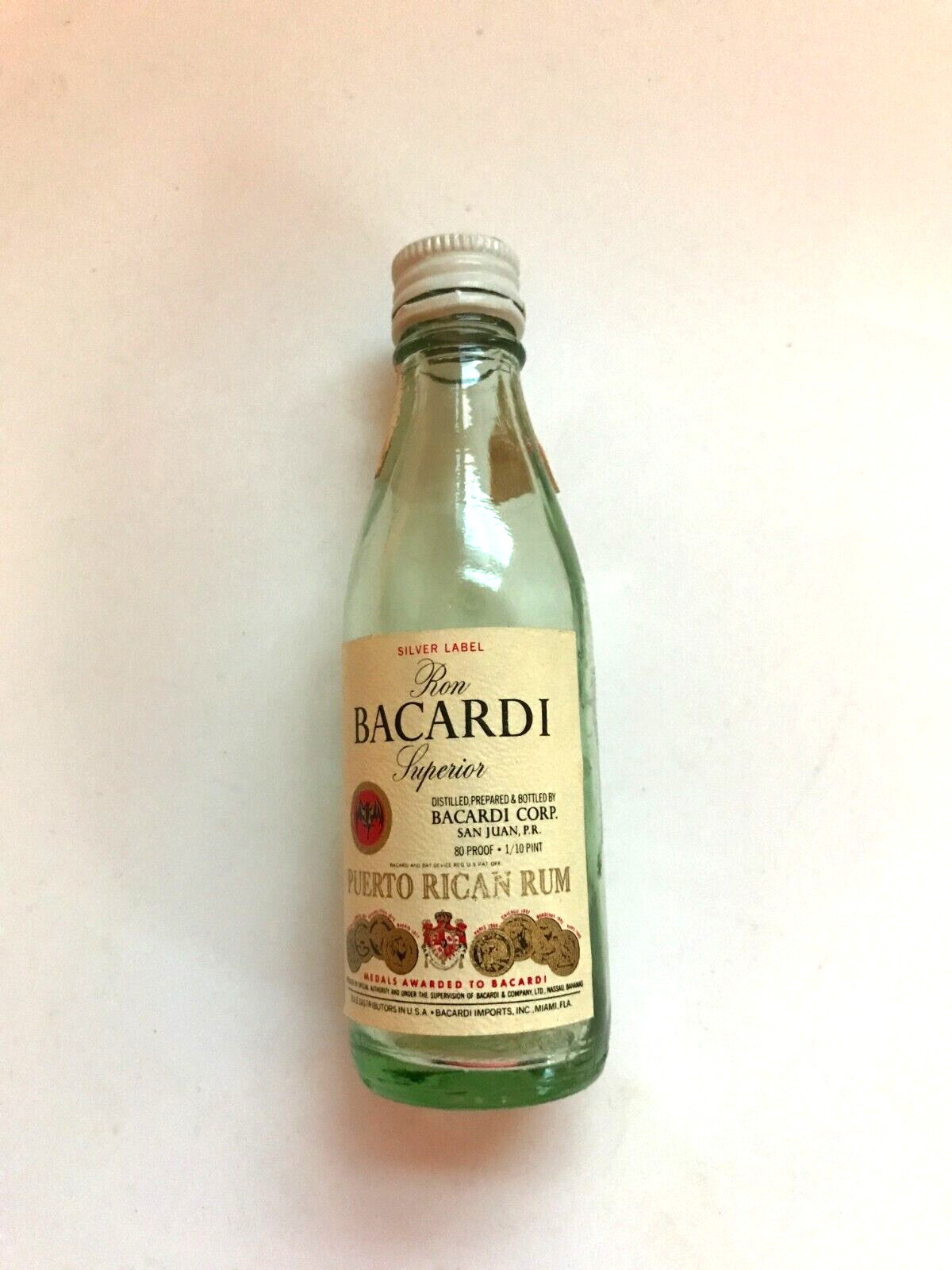 BACARDI RUM MINI BOTTLE  EMPTY to COMPLY WITH EBAY RULES & USPS SHIPPING