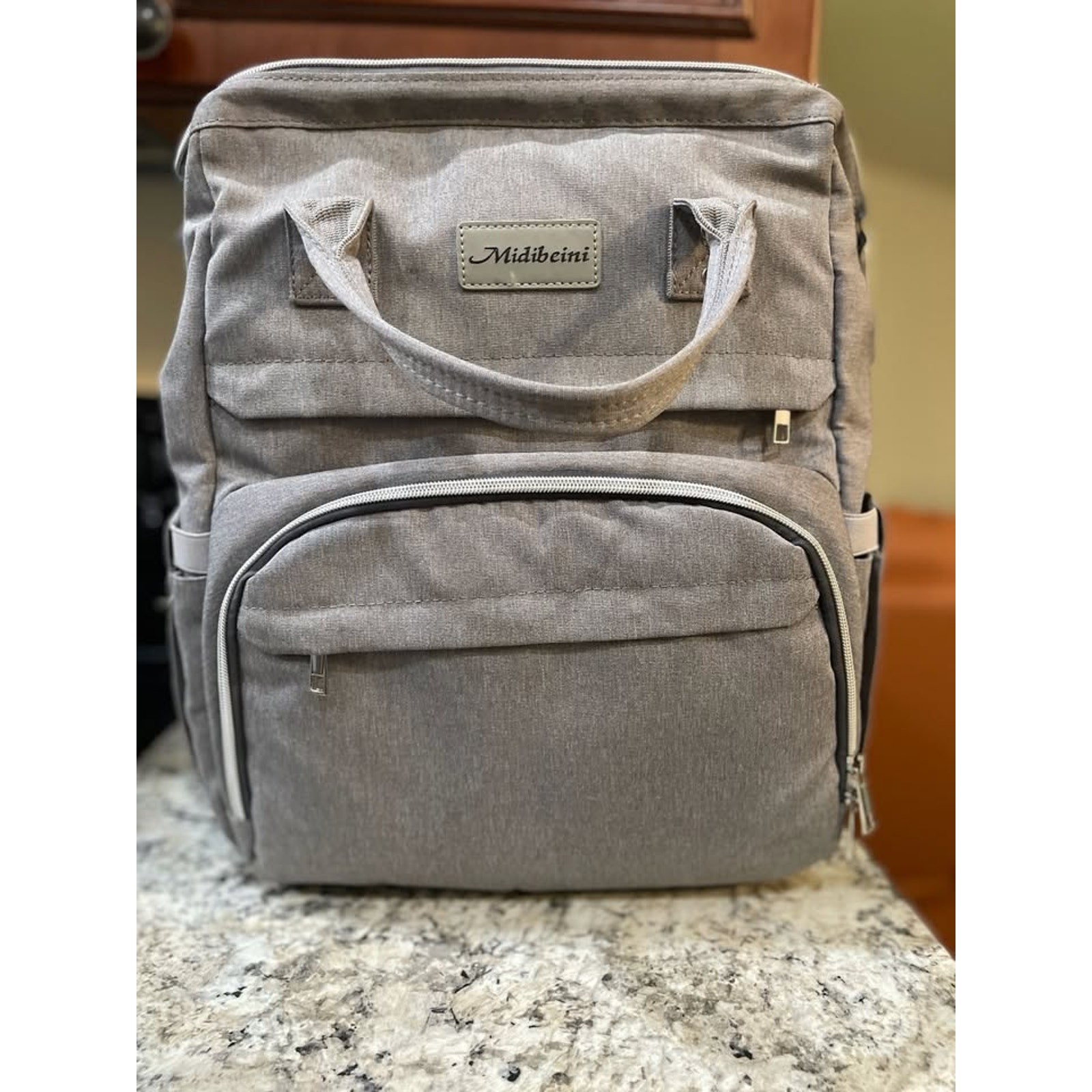 Midibeini 6-in-1 Expandable Diaper Bag Backpack with Changing Station