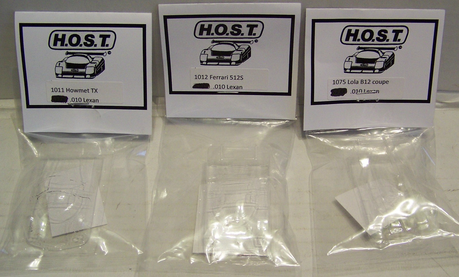 3 slot car Lexan bodies Ferrari 512s, Lola B12 coupe, Howmet TX .010 w/mask