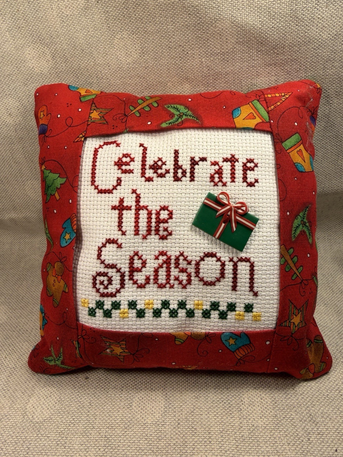 FINISHED CROSS STITCH PILLOW/ORNAMENT  CELEBRATE THE SEASON 6”x6”