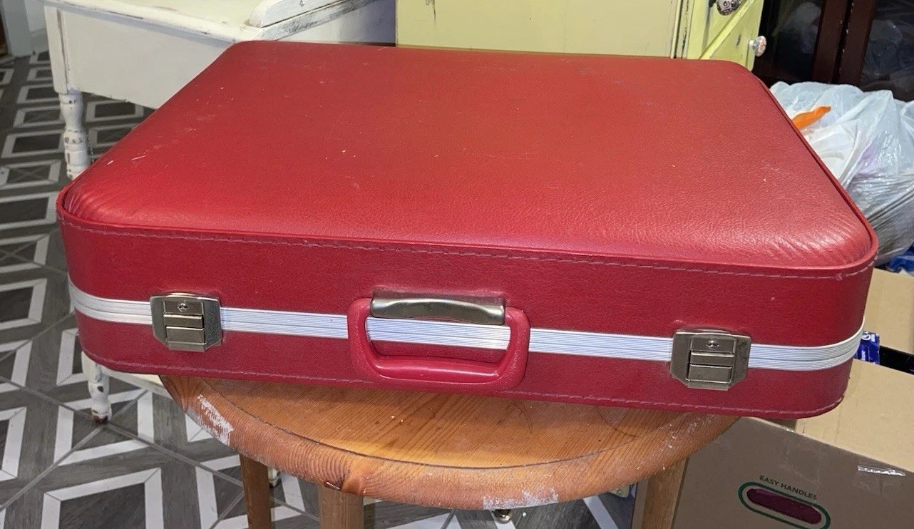 Vintage American Tourister Tiara red hard-shell suitcase from the 1960s