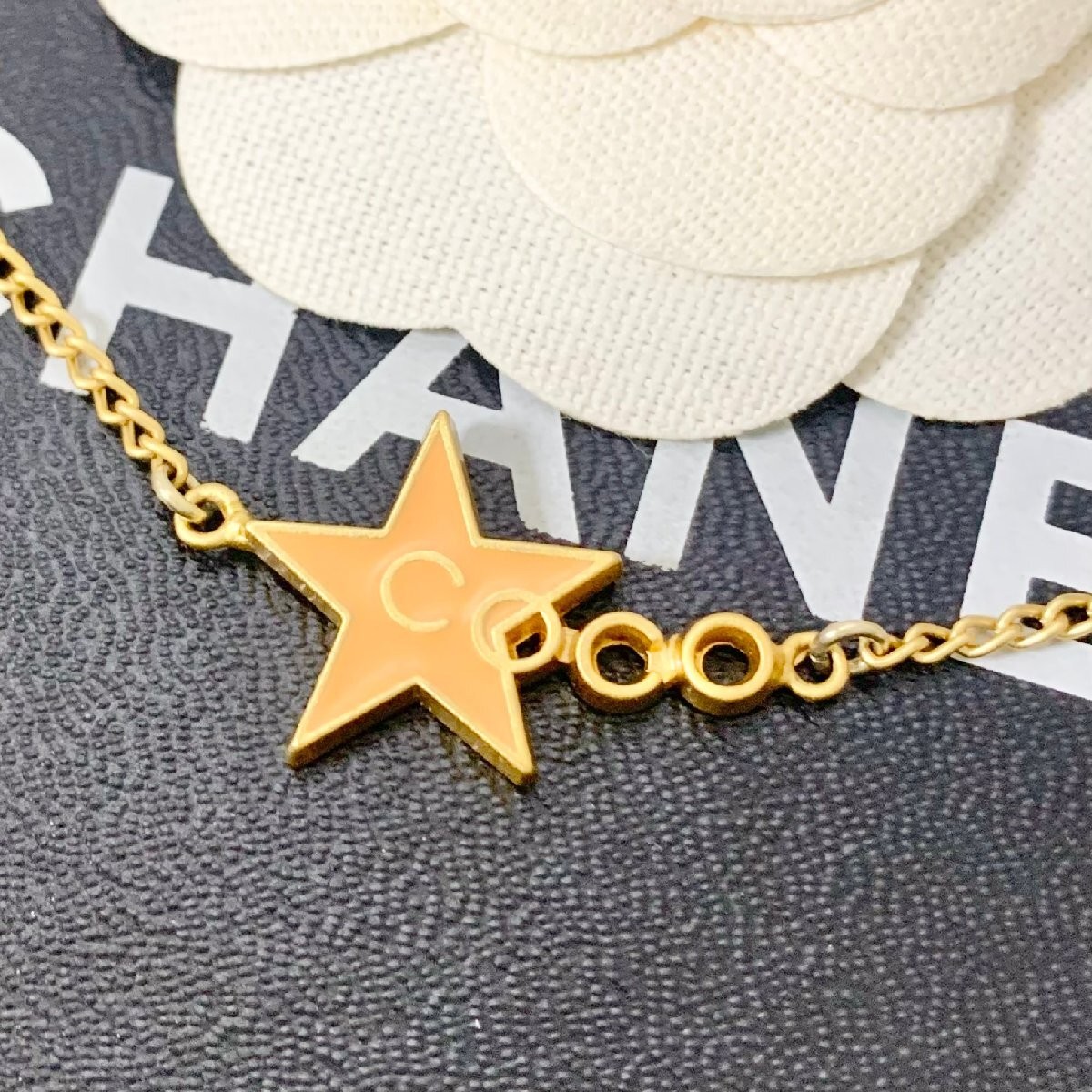 CHANEL necklace star COCO gold orange logo
