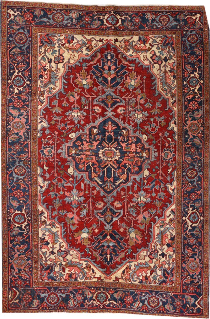 An Antique 4'-9" x 6'-11" Genuine Heriz Circa 1920