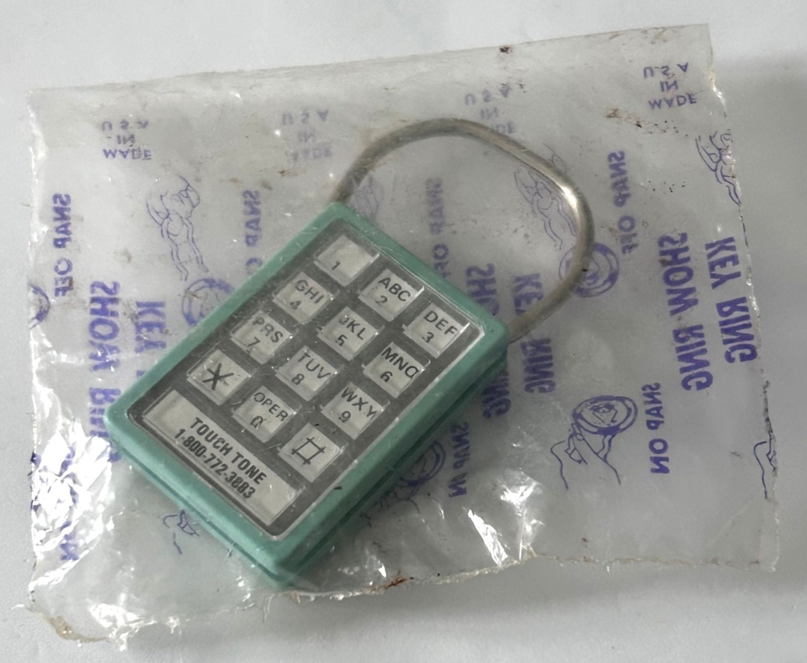 Vintage Peoples Bank Touch Tone Keyring Phone Dialer Collectible