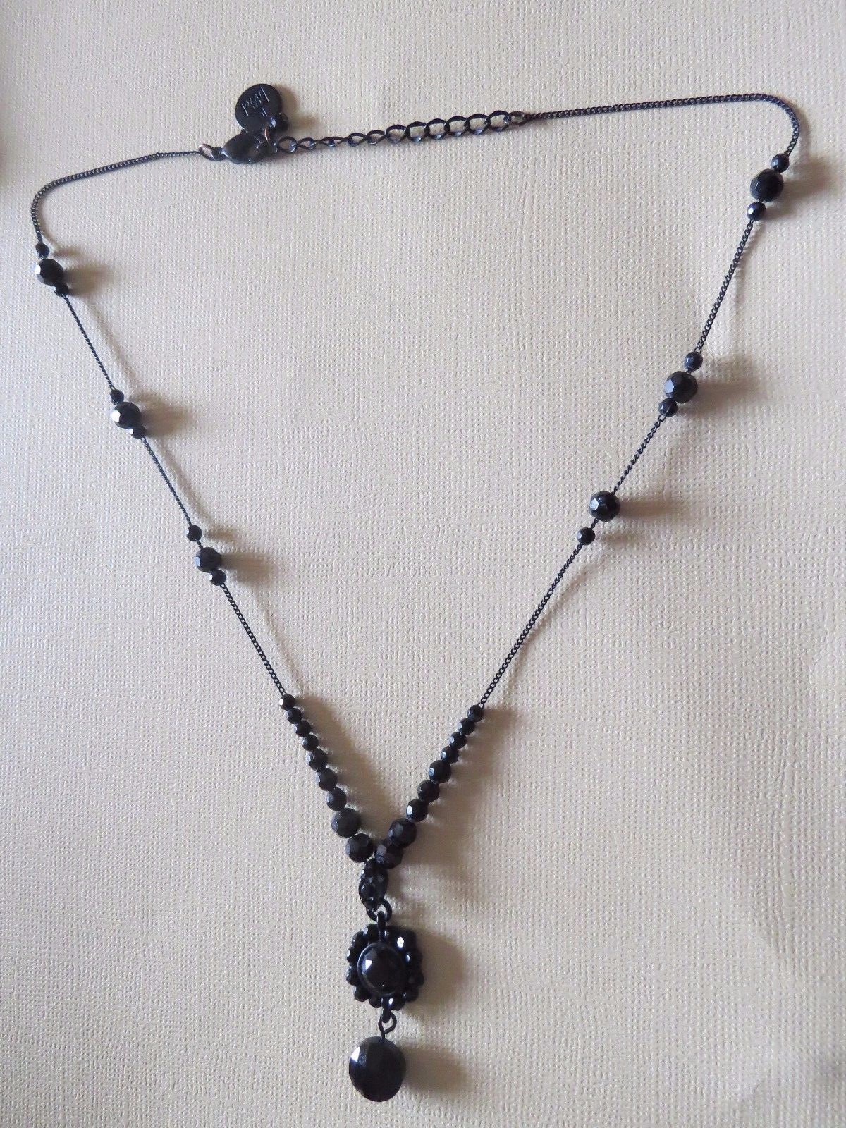 LIZ CLAIBORNE ALL BLACK JET CUT CRYSTAL NECKLACE FLOWER PENDANT~BLACK CHAIN~