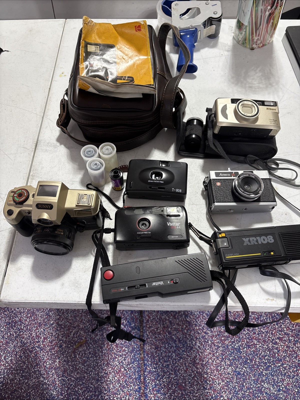 Lot Of 7 Misc Cameras, Film, Bags Etc , Conditions Unknown