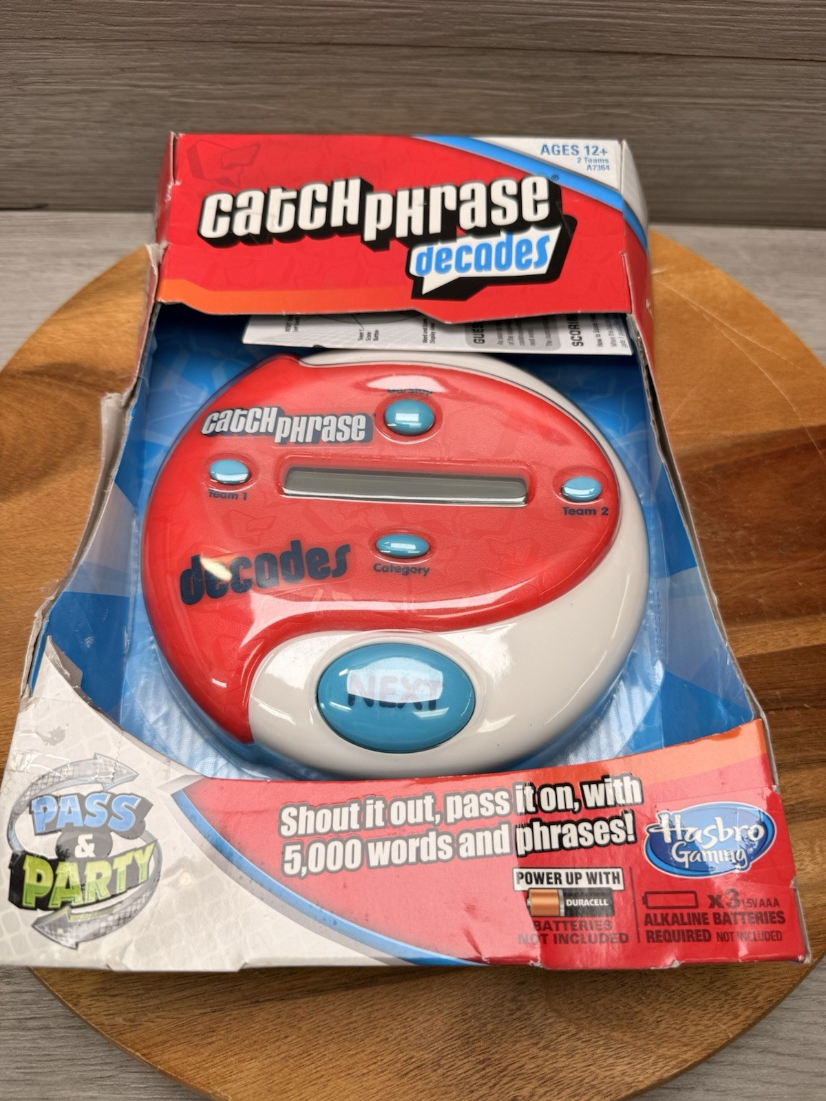 Hasbro Gaming Electronic Catch Phrase Decades Pass & Party Game 2013