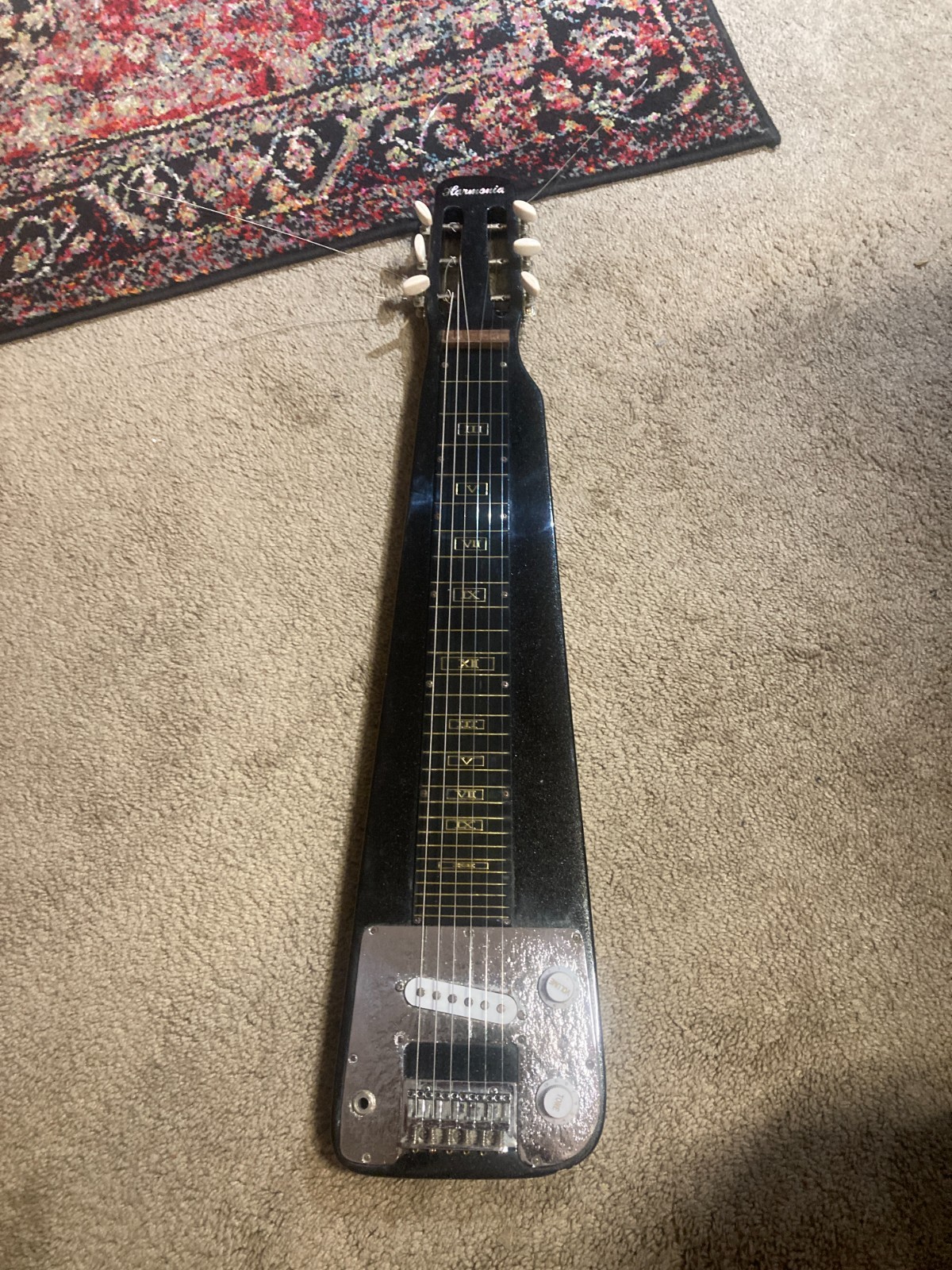 Vintage - Harmonia lap steel guitar.  Very nice.