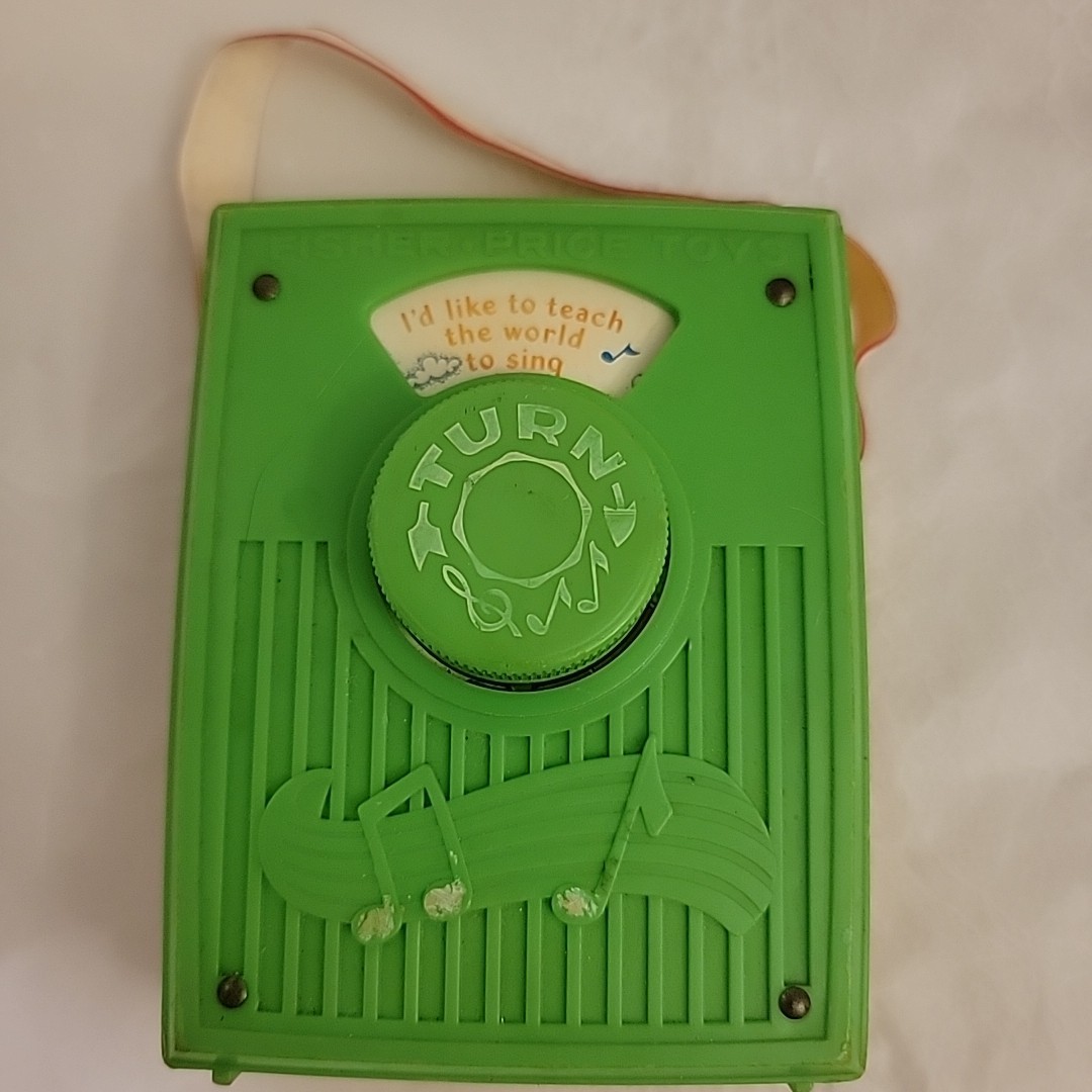 Vintage Fisher Price Pocket Radio Music Box Teach the World to Sing 1976 WORKS 