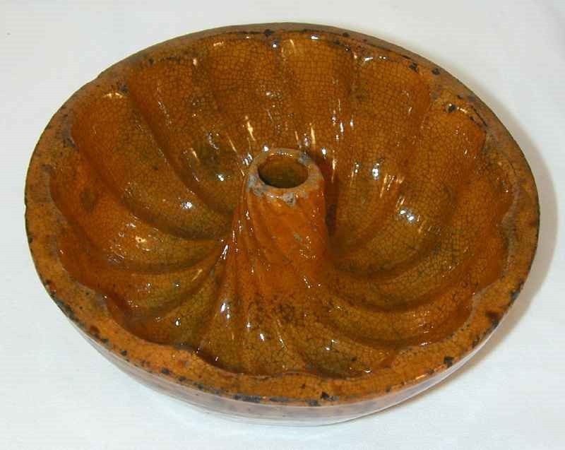 Pumpkin Color Manganese Glazed Redware Turk's Head Mold