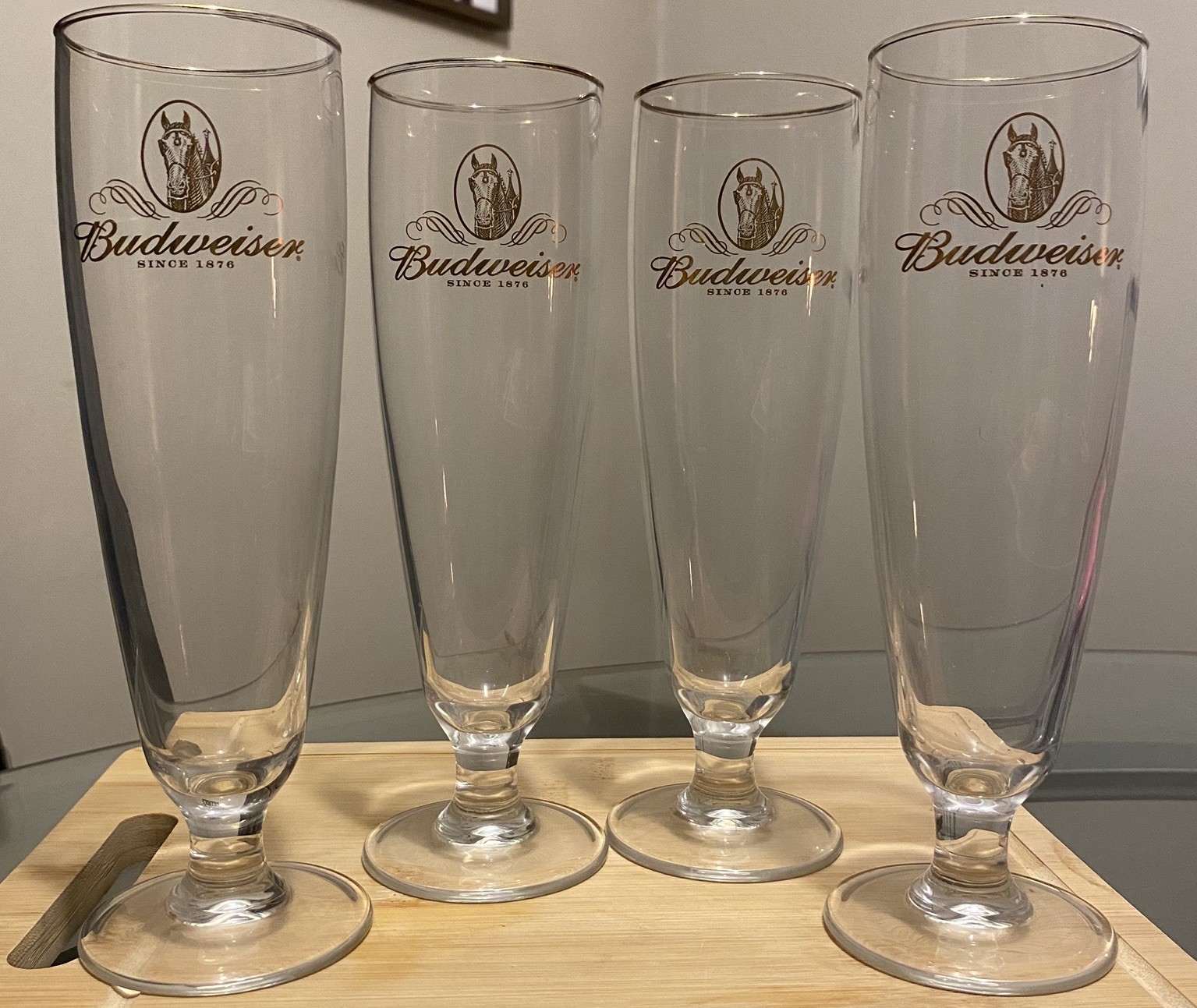 4 BUDWEISER TALL PILSNER GLASSES with CLYDESDALE HORSE'S gold rim 