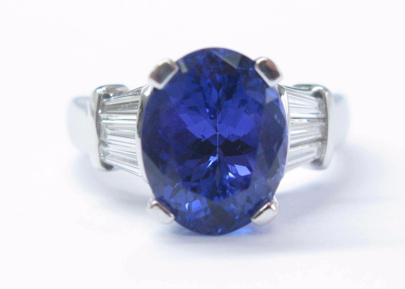 18Kt NATURAL Tanzanite & Diamond Anniversary Solitaire W Accents Ring WG 5.42C