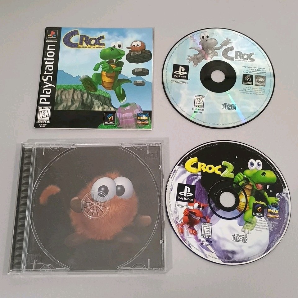 Croc: Legend of the Gobbos Black Label w/ Manual + Croc 2 (Disc Only) - PS 1