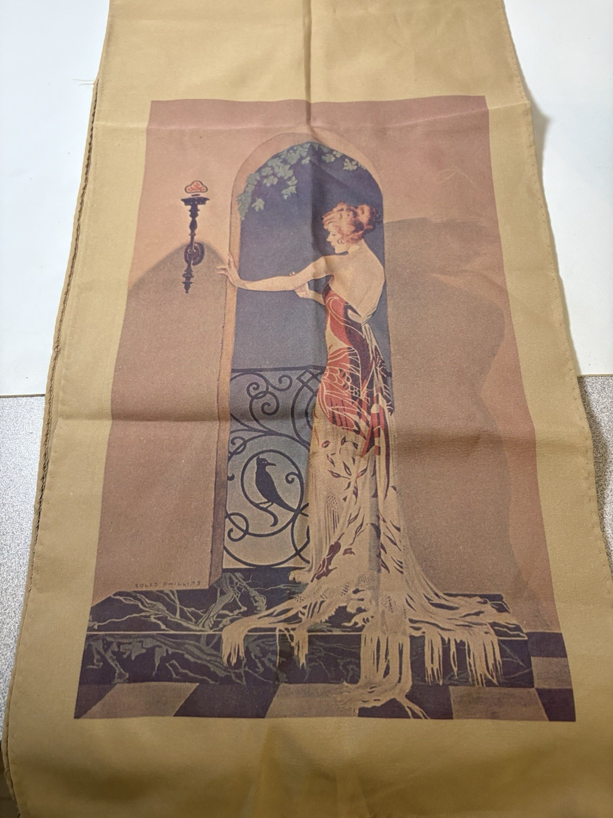 textile decorative piece featuring a 1920s Art Deco illustration