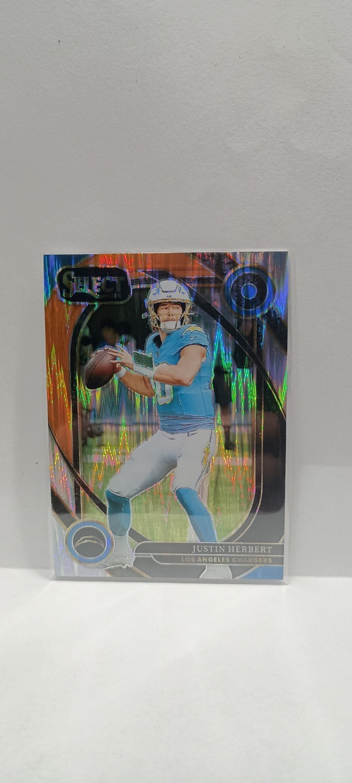 2024 Panini Select - Club Level Justin Herbert #232 Black & Orange Shock Prizm