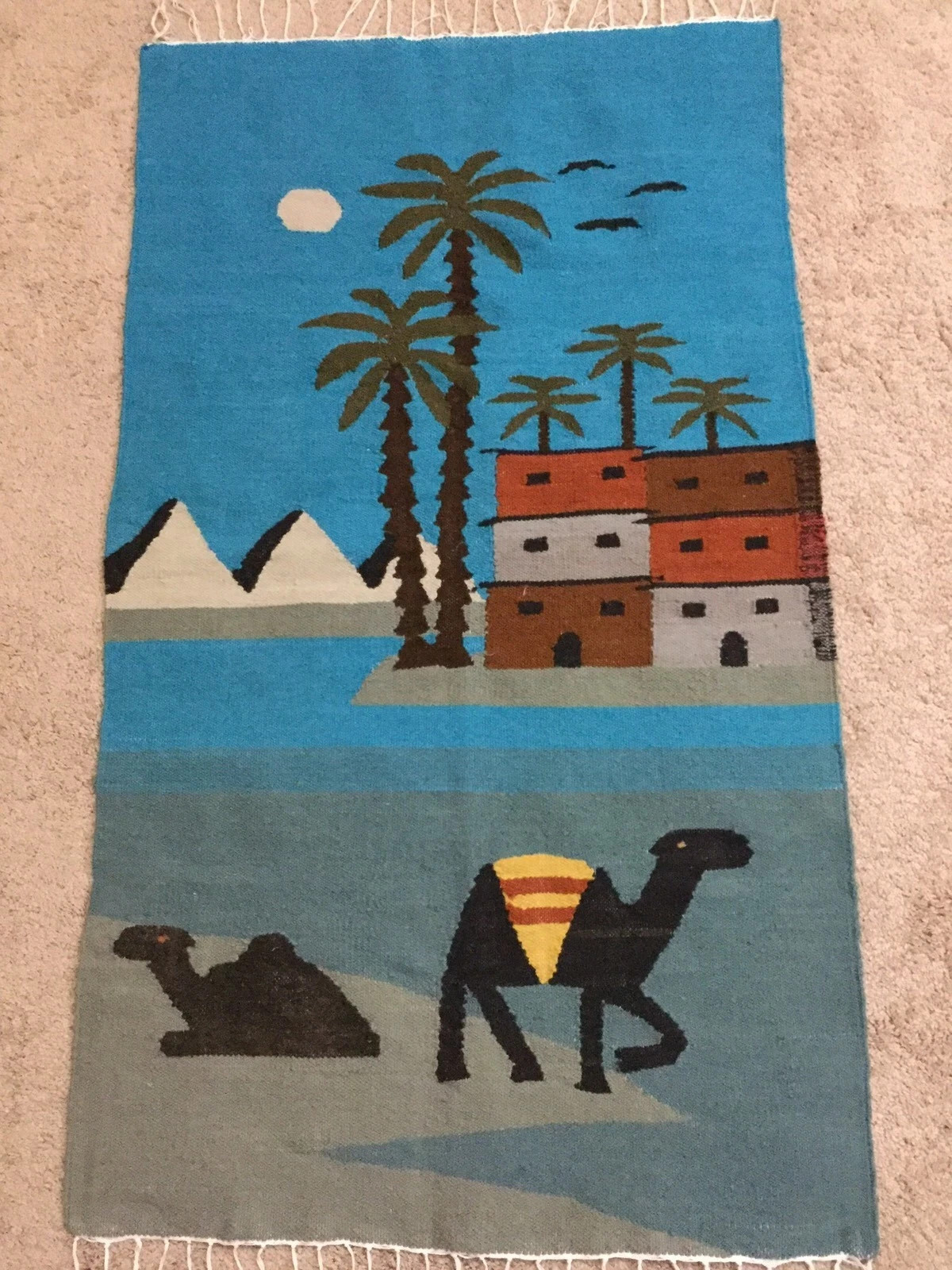 An antique Egyptian tapestry, handmade from 100% pure natural wool, depicting th