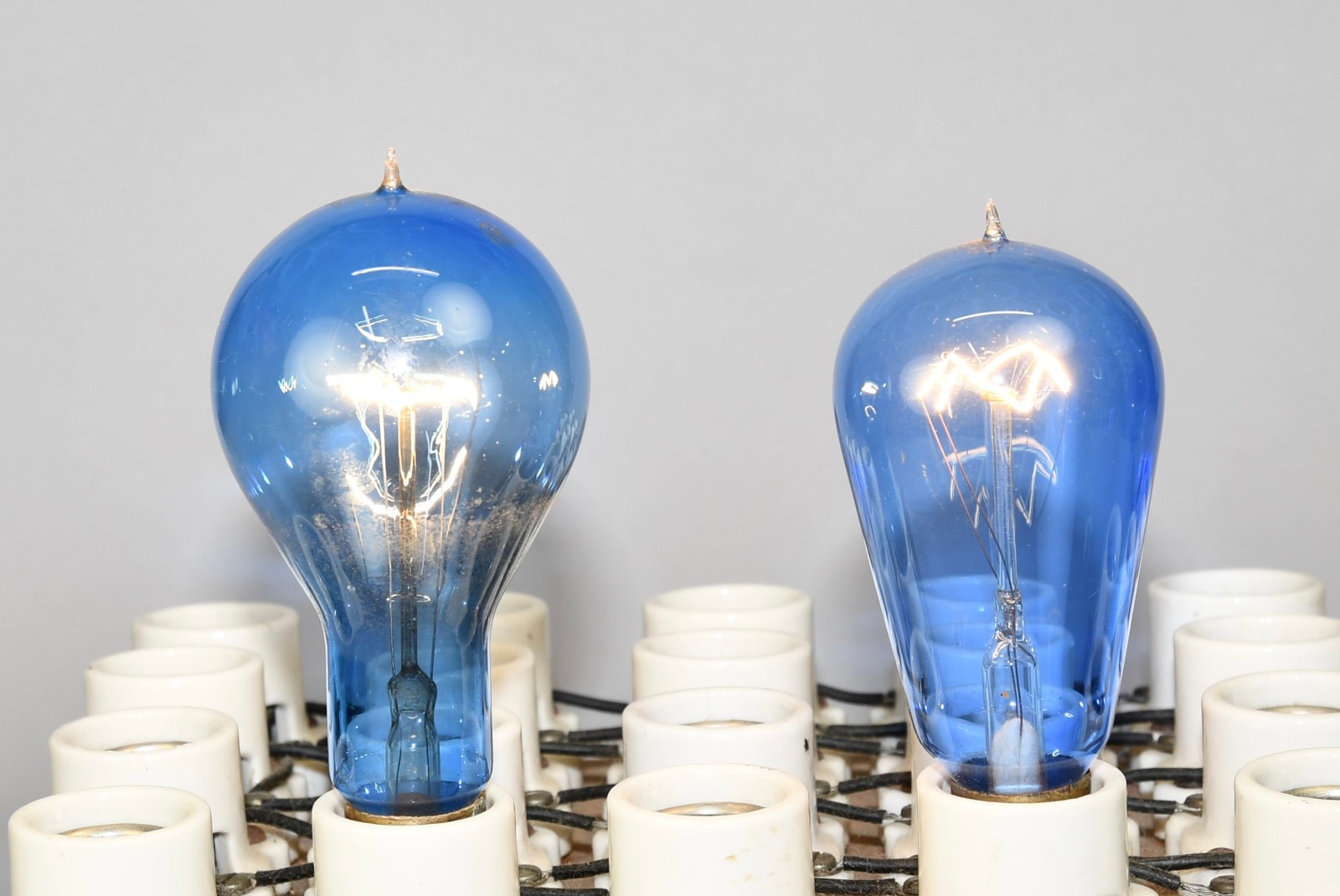 LOT OF 2 ANTIQUE BLUE GLASS CARBON TIP MEDIUM BASE E26 WORKING LIGHT BULBS!