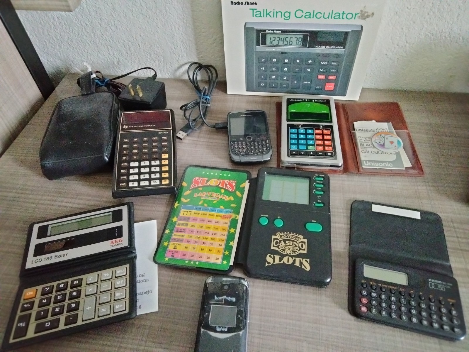 Vintage Junk Drawer Lot of  Electronic Gadgets - Games - Calculators -Blackberry