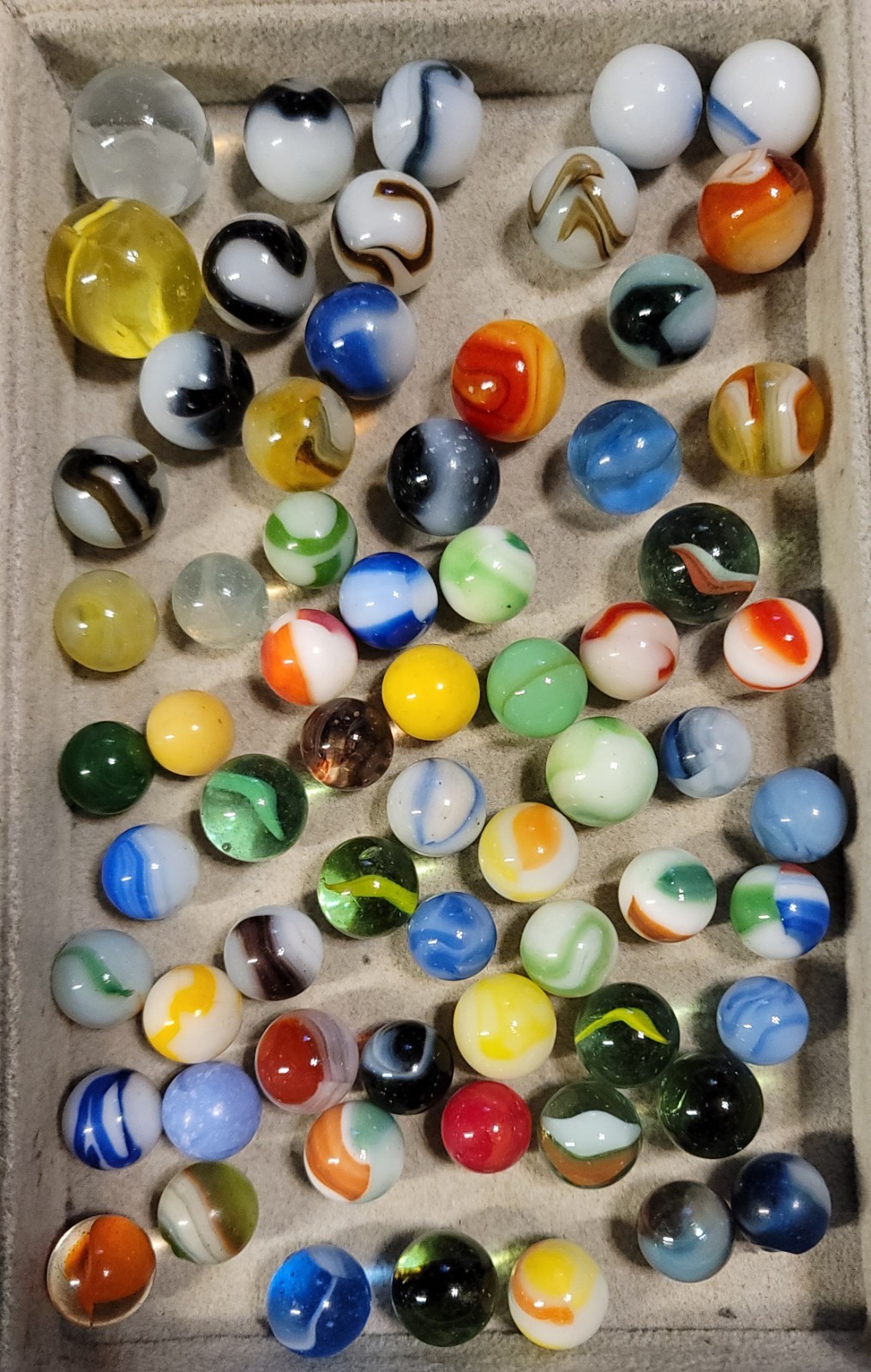Assortment Of 45 .55-.59 Size Marbles, 19 .75 Size Marbles, & 2, 1 Inch Shooters
