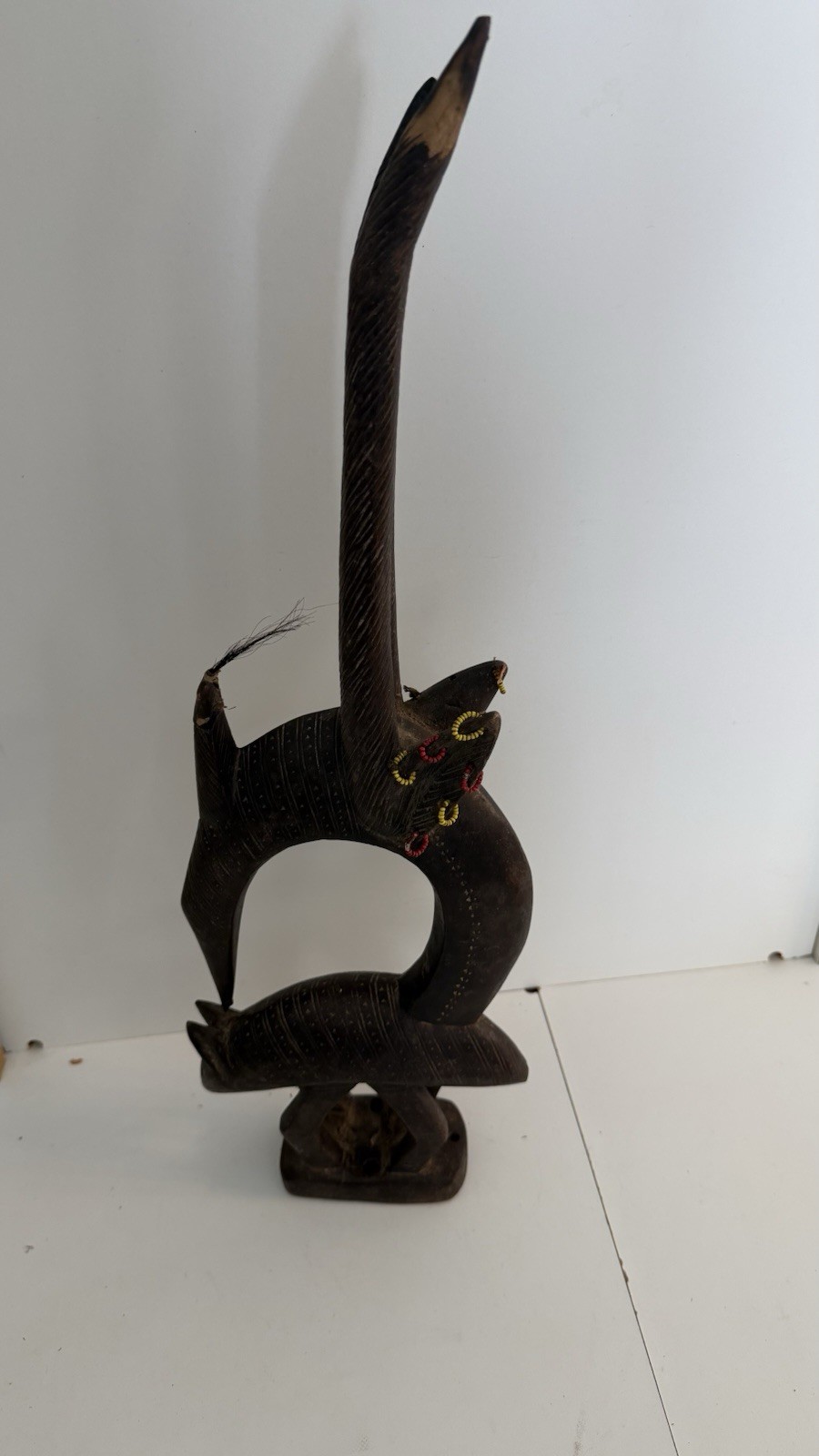 Antique African Hand-Carved Wooden Sculpture Brown Figure with Elongated Horns