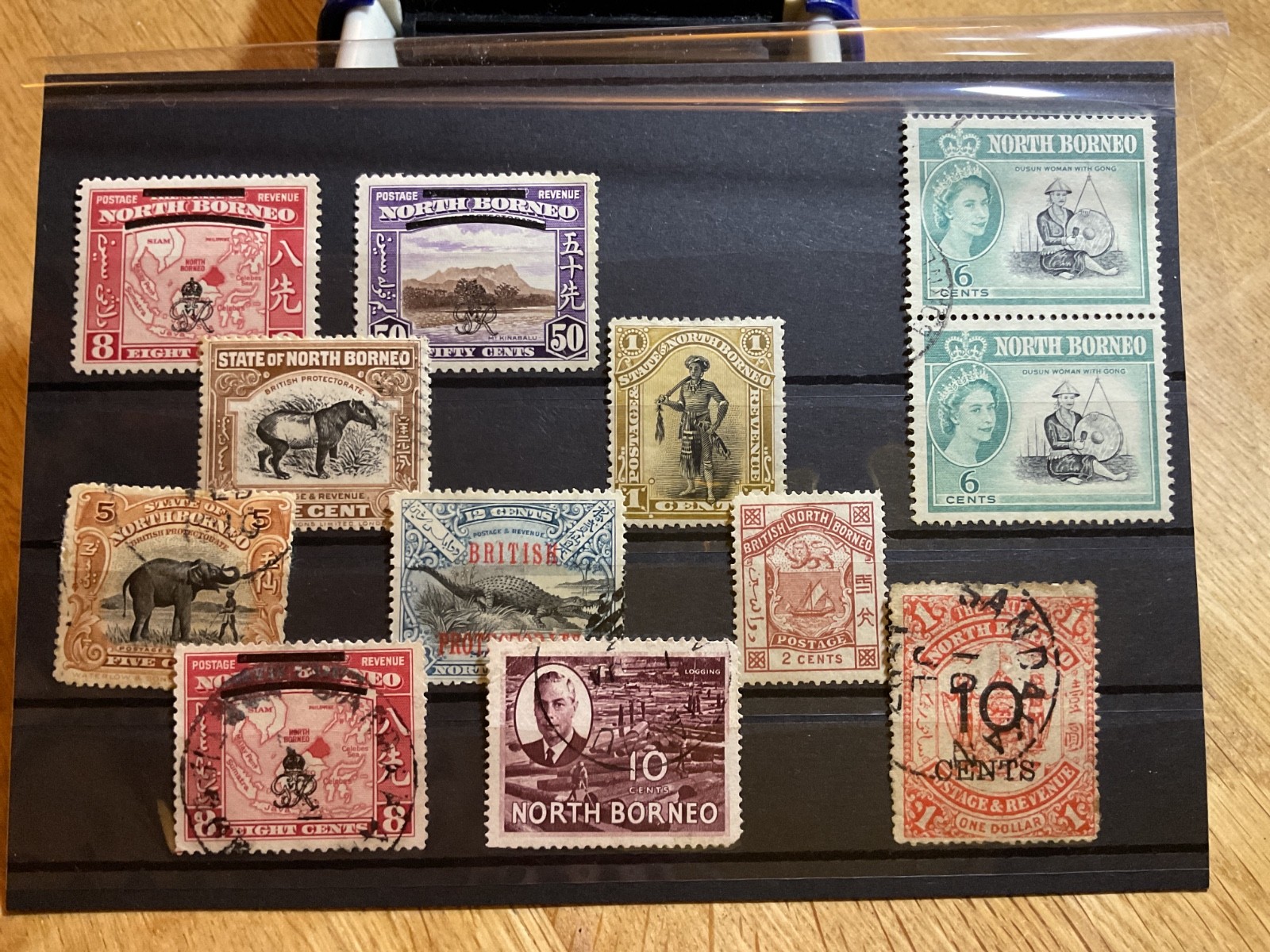 North Borneo mounted mint or used stamps on 3 cards  B3119