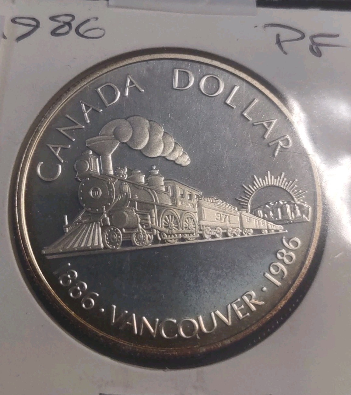 Canada Silver ,One Dollar,Trans Canada  1986 Canoe 23 Gr Uncirculated 