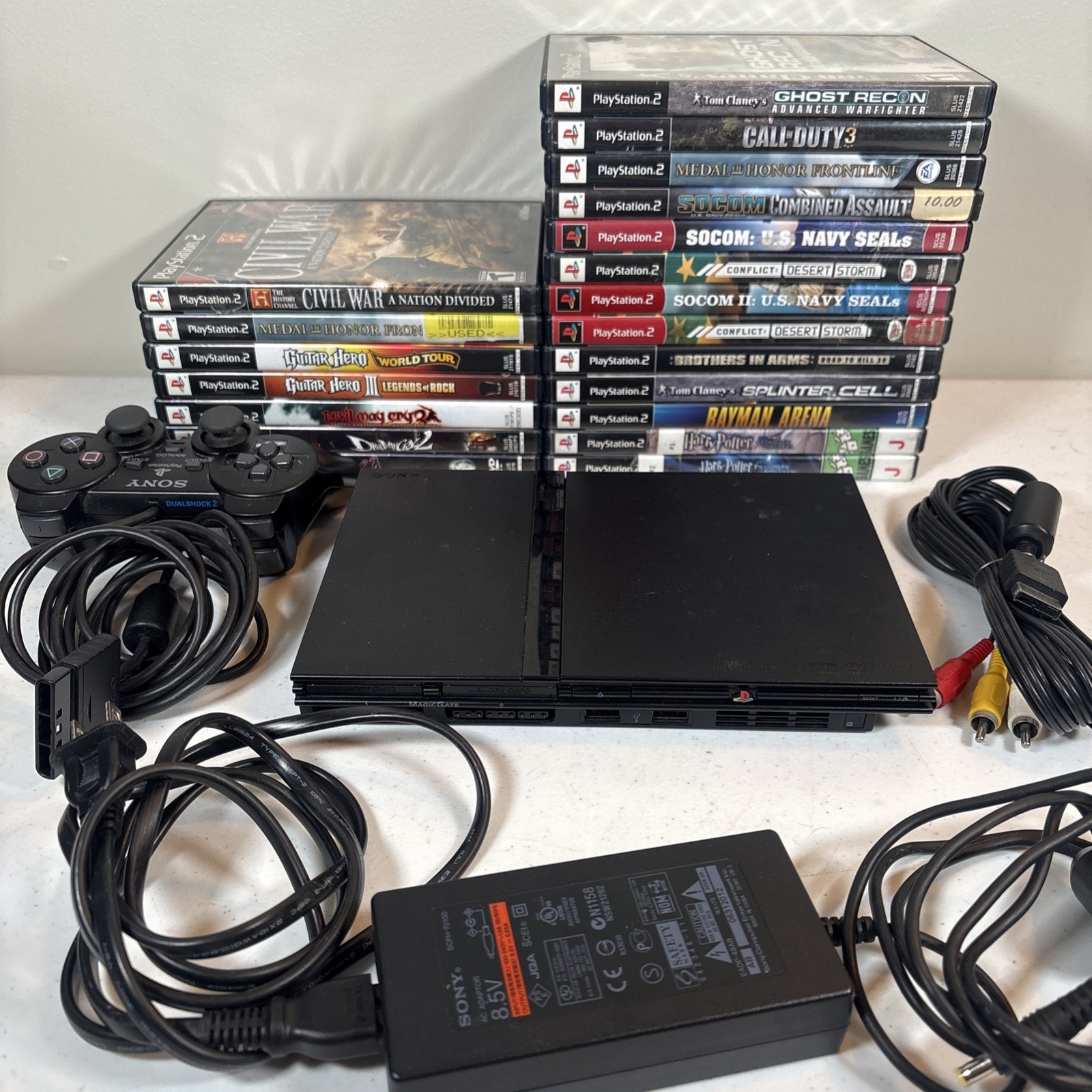 PlayStation 2 70001 PS2 console, controller, cords and Lot of 20 games READ