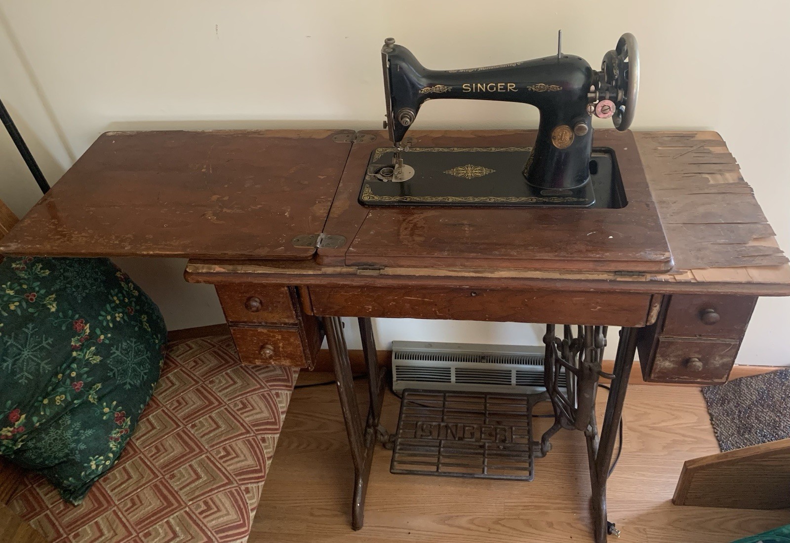 Antique Vintage Singer sewing machine in cabinet. Treadle Table Wrought Iron.