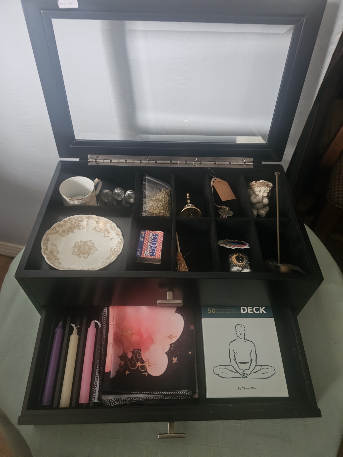 Black jewelry box.. glass top.. lined velvet compartments.. wood