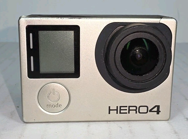 GoPro HERO 4 Lot New Batteries(2) New Charger 64GB Micro SD Small Crack See Pics