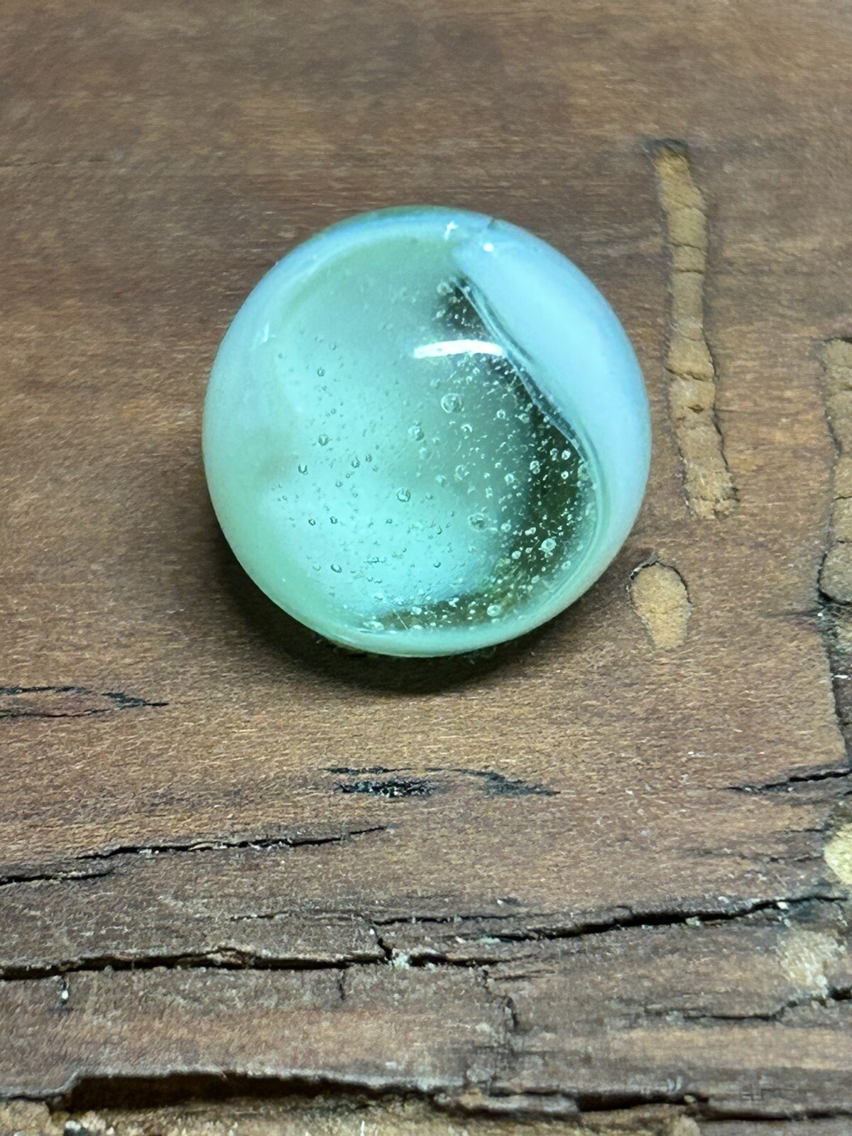 Vintage Peltier NLR clear Greenish base full of bubbles  .58”