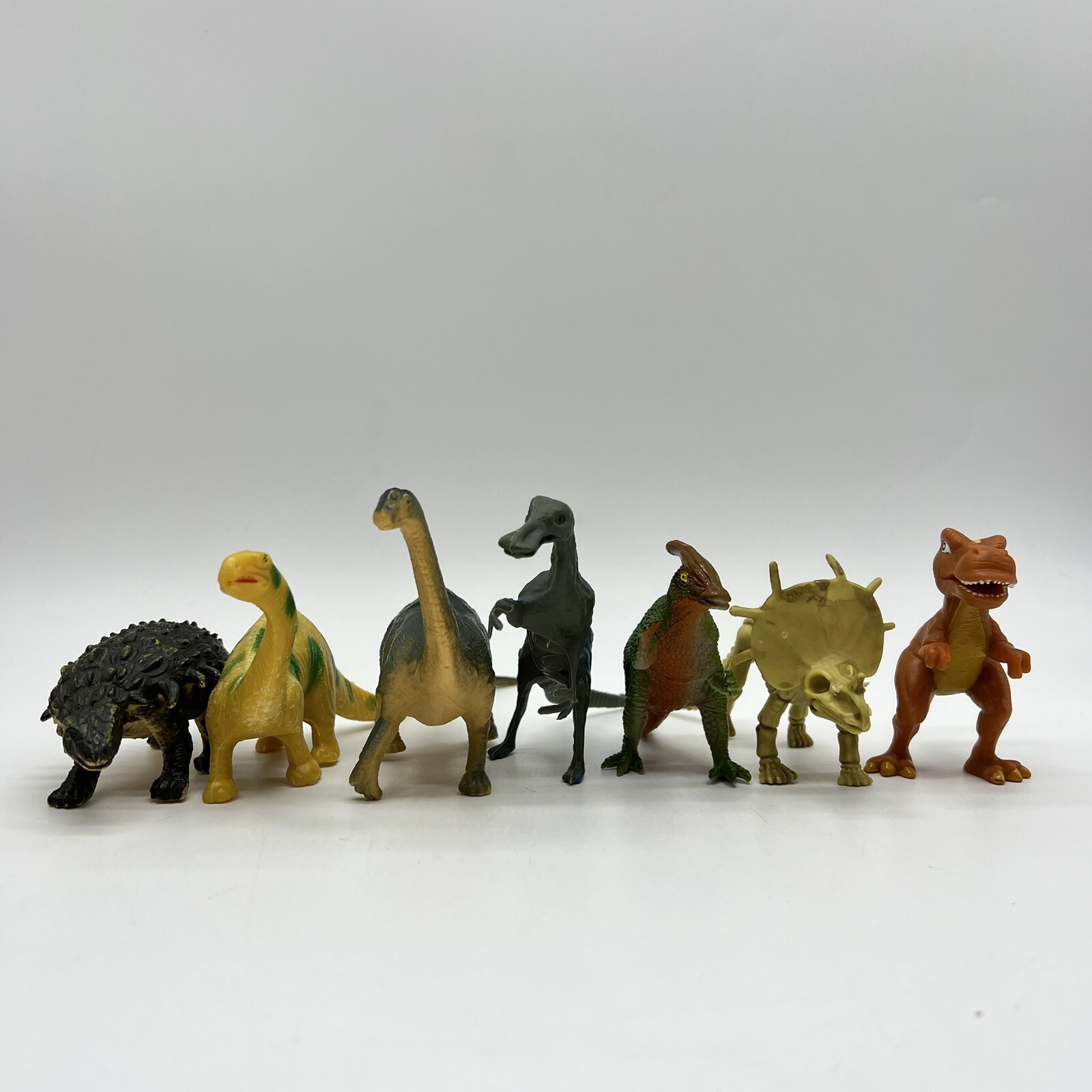 Unbranded Lot Of 7 Dinosaur Figures Toys Educational Plastic PVC