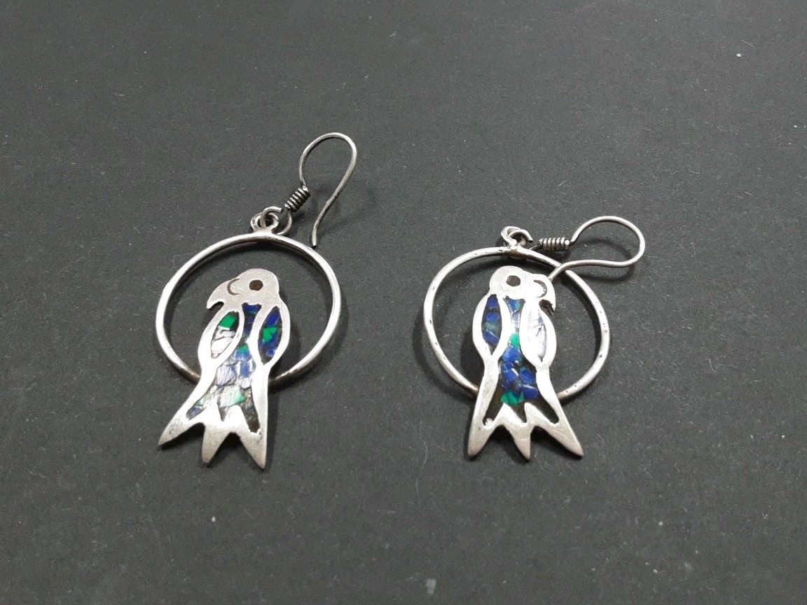 Vintage Taxco sterling silver earrings feature a parrot inlay design dangle wire