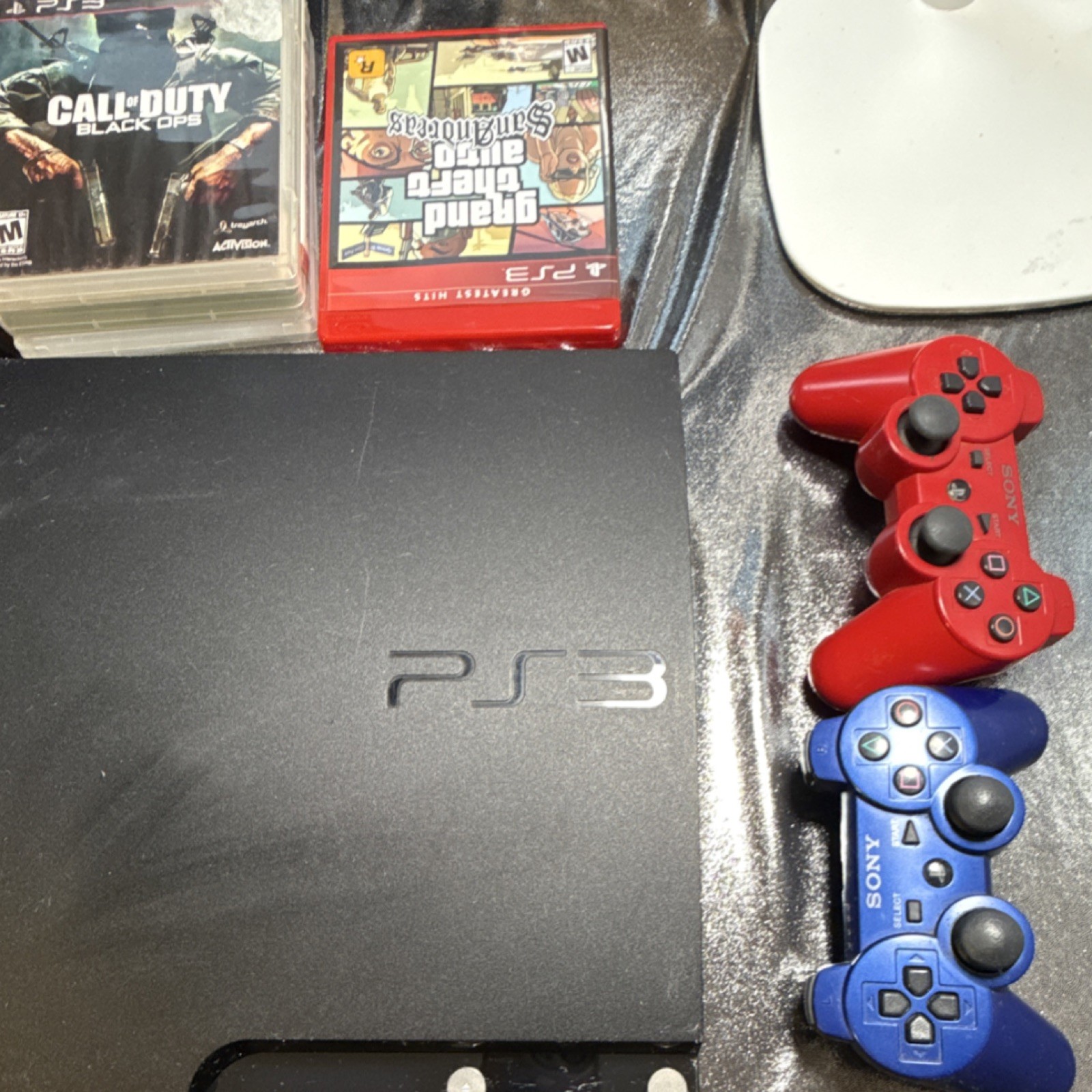 Sony PlayStation 3 Console with Controllers and Action/Adventure Games Lot