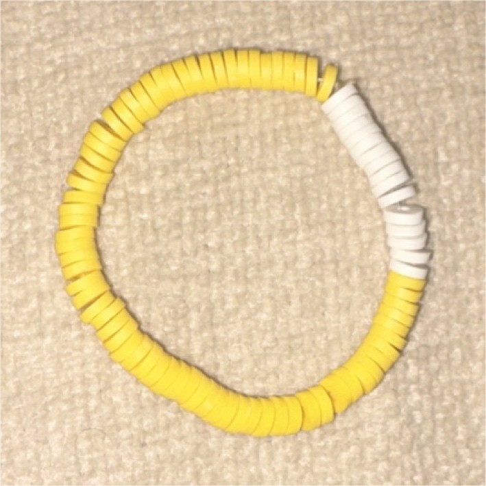 Yellow and White Heishi Beaded Bracelet