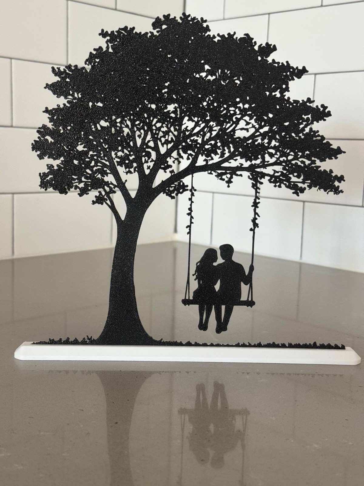 Couple Silhouette-Couple on a Swing