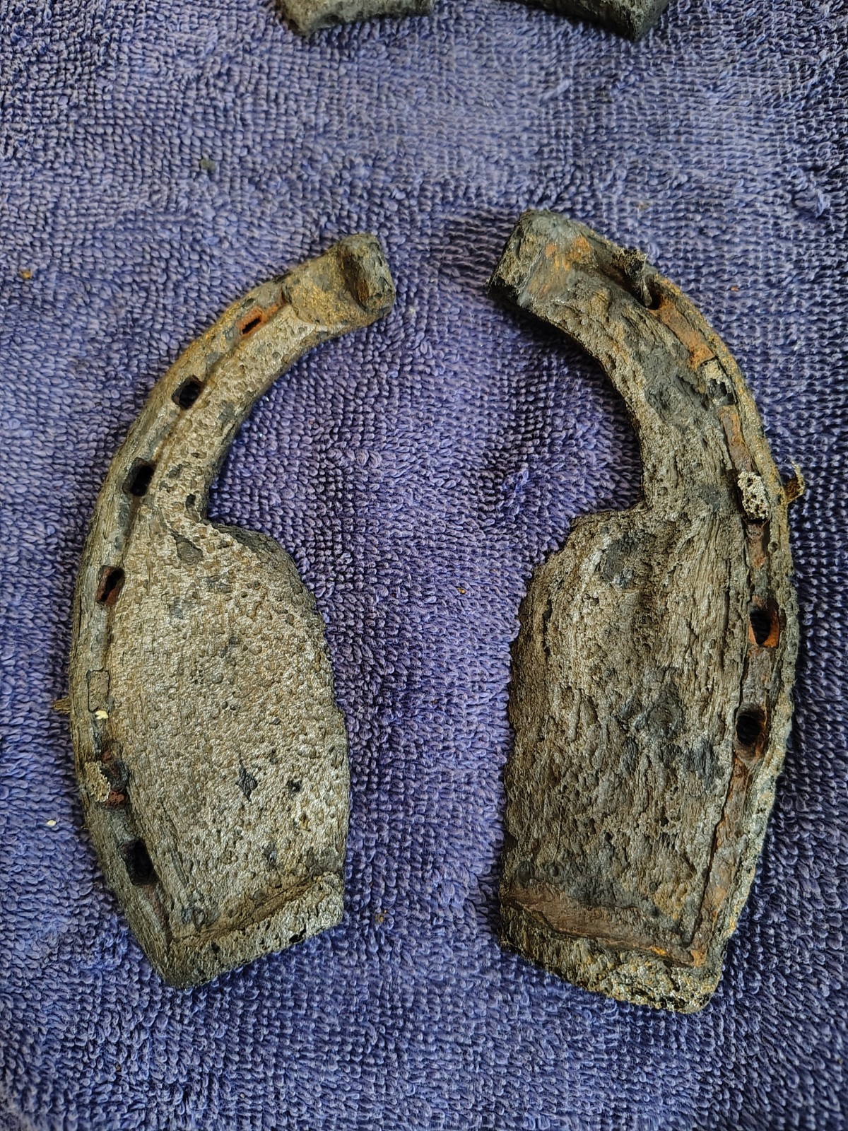 **Two 1800's primitive cast/wrought iron ox shoes. Antique. #9