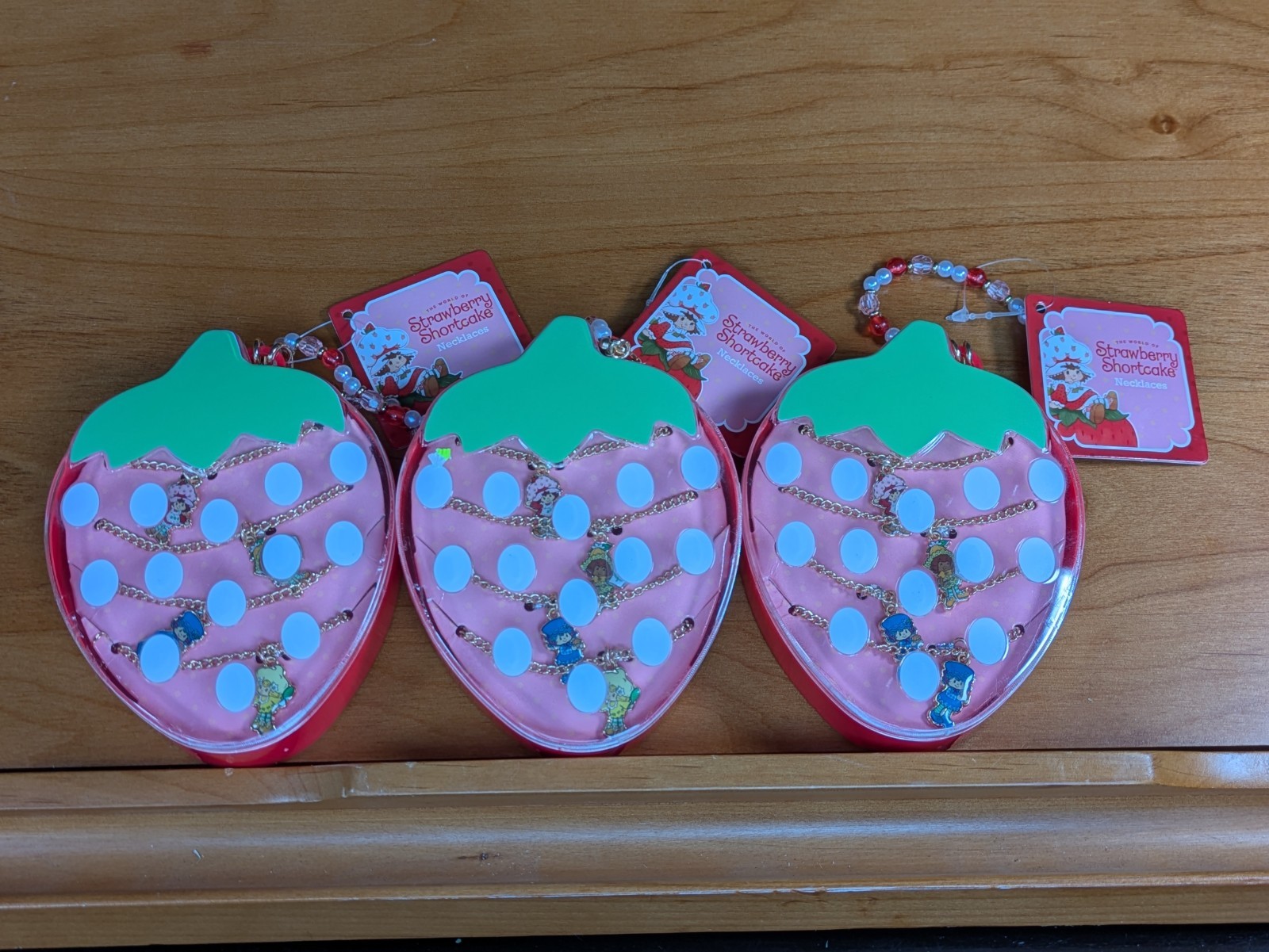​Lot of 3 Strawberry Shortcake & Friends Necklace Sets NWT Rare Factory Error HT