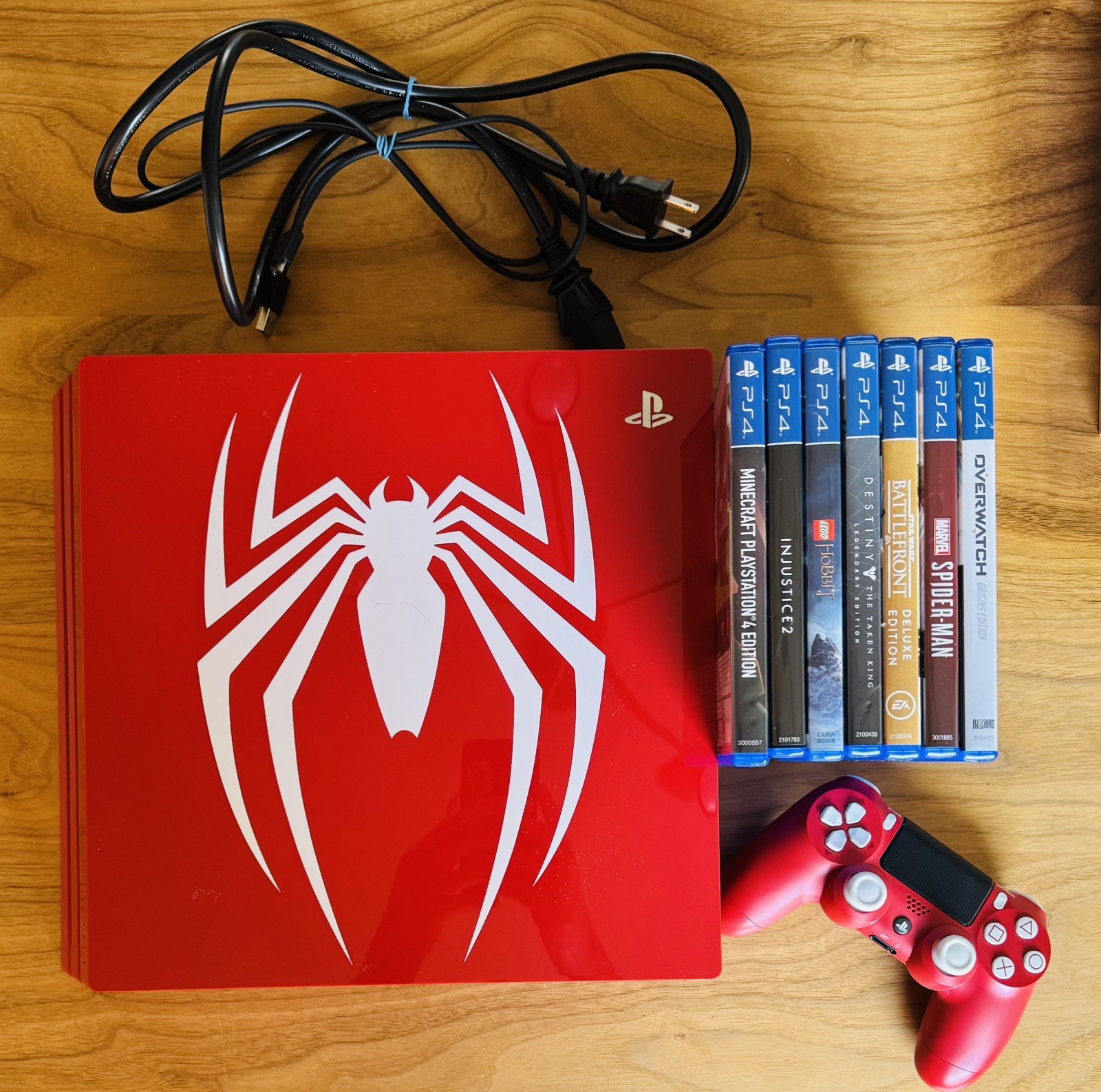 Sony PlayStation 4 Pro Limited Edition Spiderman Console/Controller and 7 Games