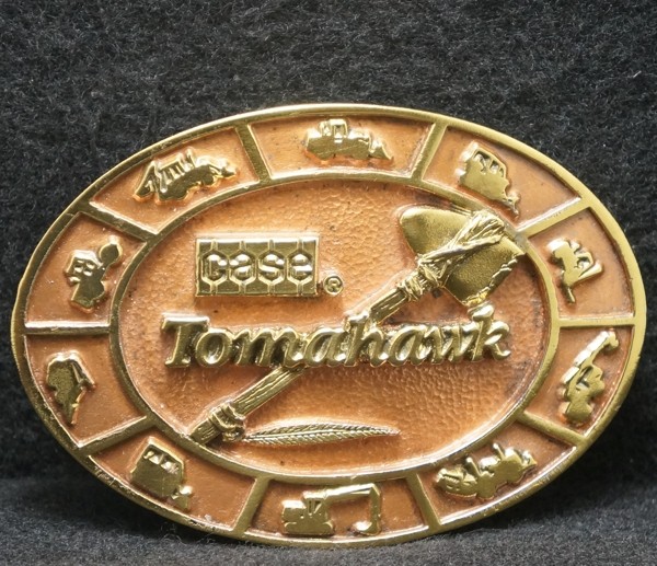 XA03132 NOS VINTAGE 1989 CASE TOMAHAWK HEAVY MACHINERY ADVERTISEMENT BELT BUCKLE
