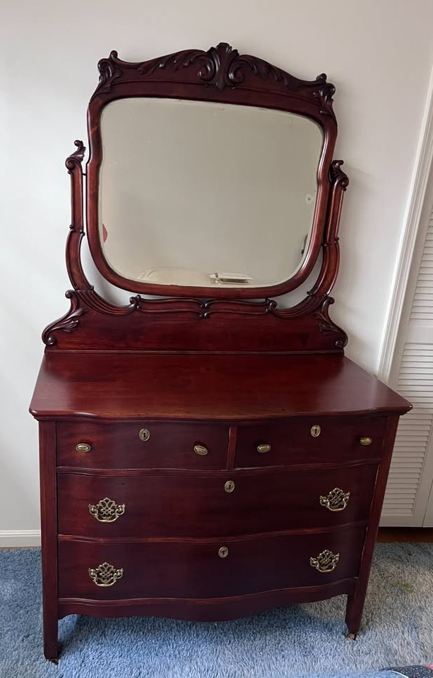 Beautiful antique dresser and mirror with cherry/mahogany finish
