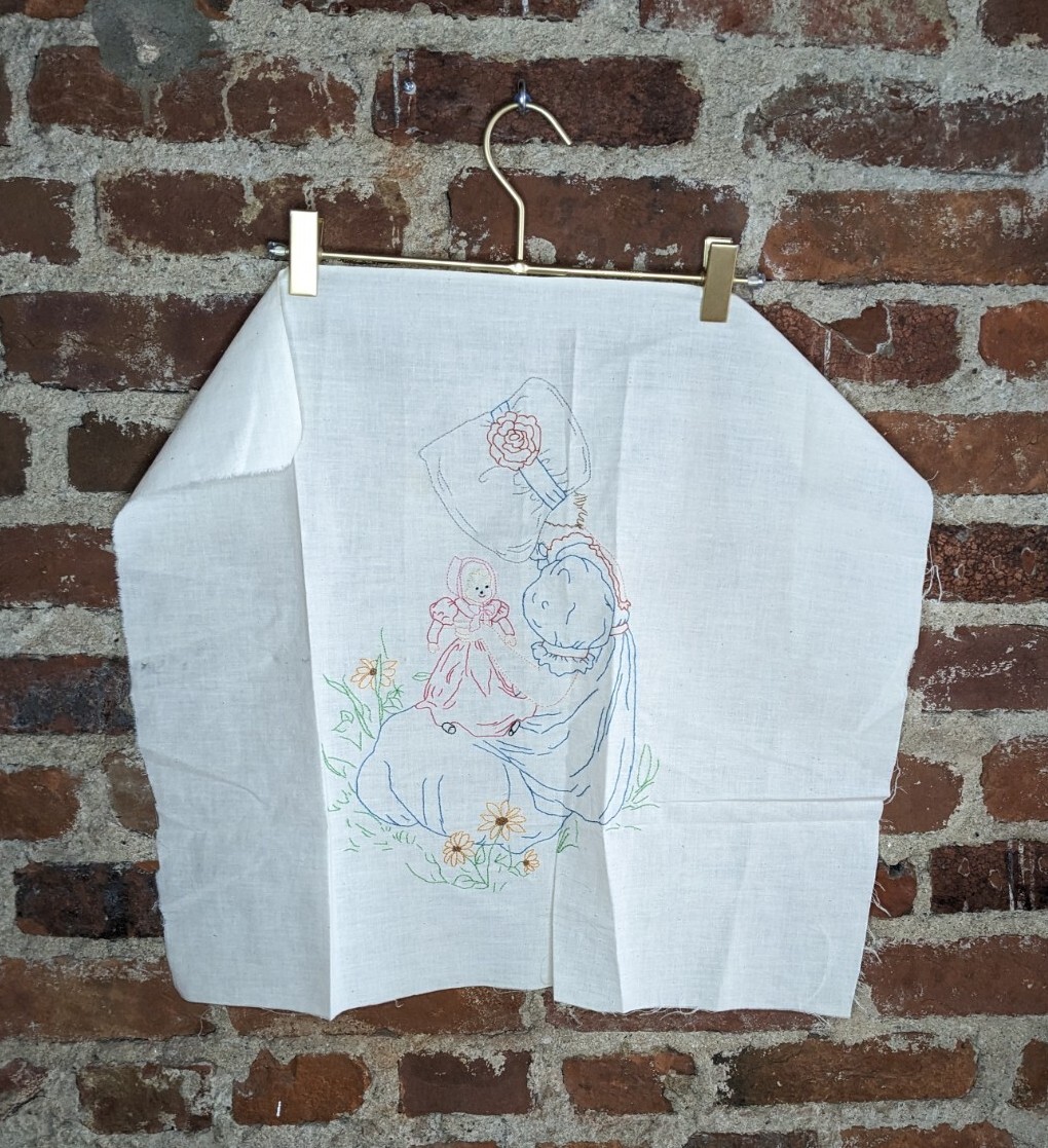 Vintage Homemade Hand Embroidered Girl in a Hat Playing with a Doll