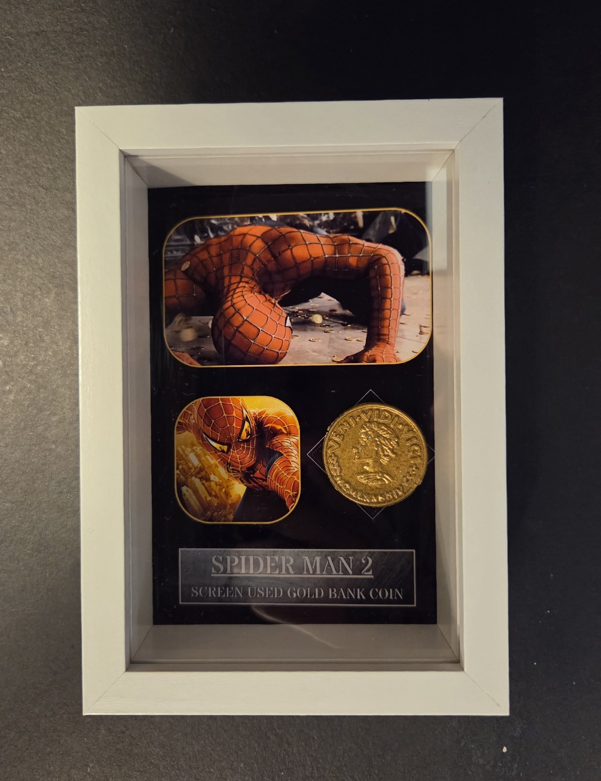 Marvel Original Movie Prop - SPIDERMAN 2vBank Metal Hero Gold Coin + Screen Used