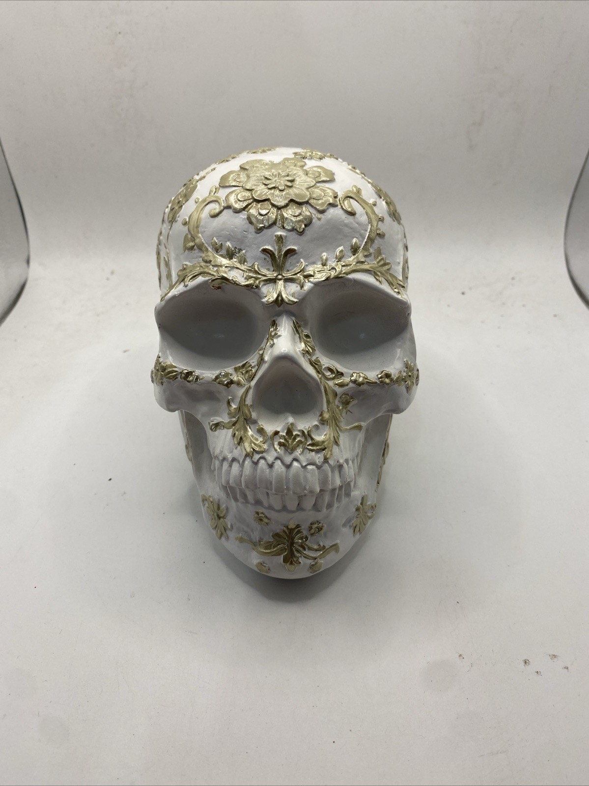 Skull Decor With a Golden Floral Design