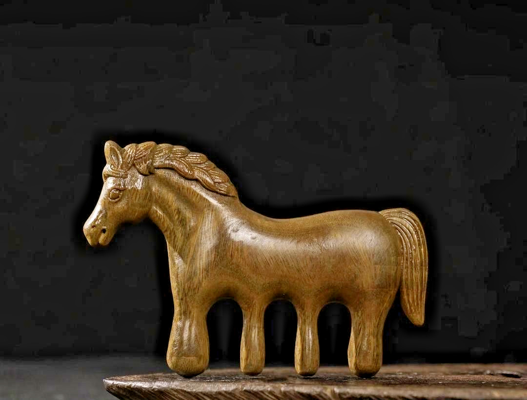 Golden Sandalwood Horse shaped Comb symbolizing good fortune